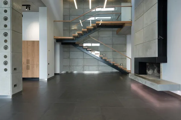 Curved stringer fabrication in progress for a Nassau County floating stair project